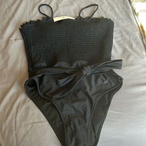 With tag, one piece bathing suit